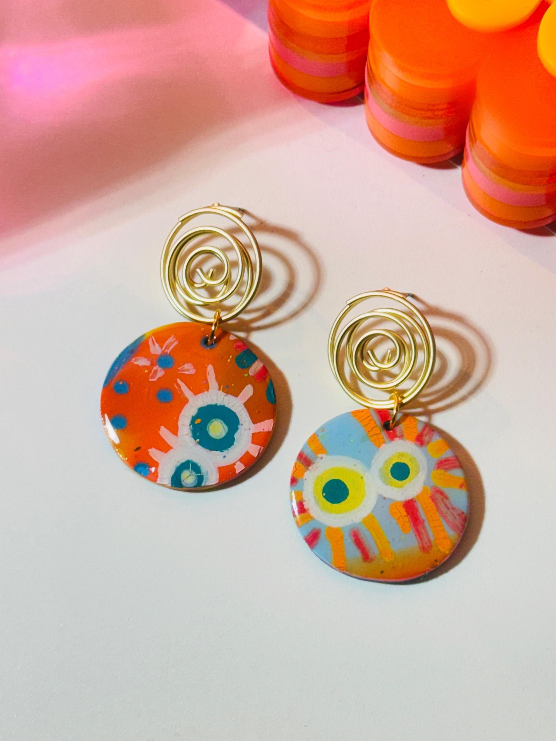 Orange Circles with Gold Spirals